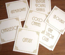 Table name cards featuring names from the Art Deco era