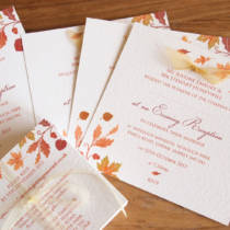 An autumn wedding invitation set finished with ribbons