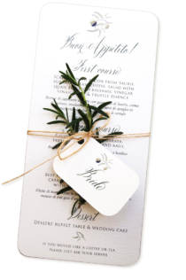 Italian style wedding menu tied with sprig of rosemary