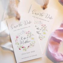 save the date tags with a wildflower group
