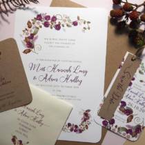 A wedding stationery set in an autumn blackberry design