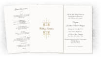 A classic folded wedding invitation with guest information sheet