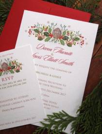 Christmas wedding invitations and RSVP in a festive holly and pine cone design