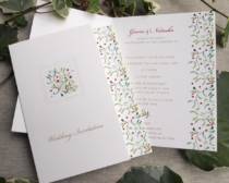 christmas wedding invitations in a booklet design with a mistletoe graphics