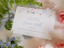 a save the date card with summer flowers